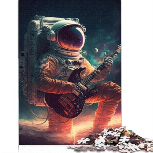 Astronaut spielt Gitarre. Familienspaß-Puzzle von Adult Puzzles aus recyceltem Karton für Erwachsene. Puzzles als Geschenk für die ganze Familie und 1000 Teile (26 x 38 cm). von AITEXI