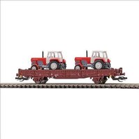 BUSCH 31514 TT Flachwagen mit Rungen Ks [3300] und 2 Traktoren ZT 300, DR, Ep. IV von Busch