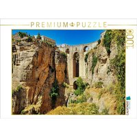 CALVENDO Puzzle In einer Höhe von rund 120 Metern überspannt die Steinbrücke Puente Nuevo die Schlucht El Tajo, in die sich Rondas Fluss Guadalevín re von Calvendo Puzzle