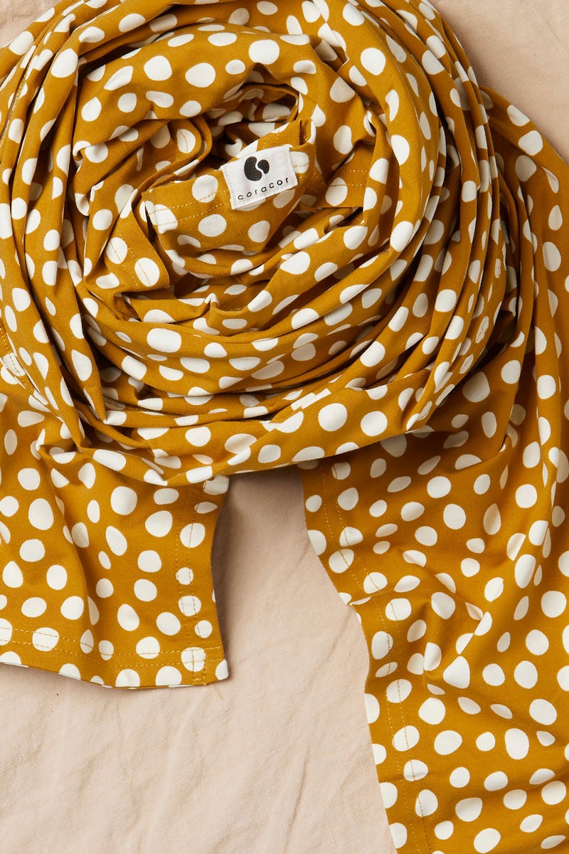 Coracor Tragetuch Dot, Mustard Coracor Tragetuch Dot, Mustard von Coracor