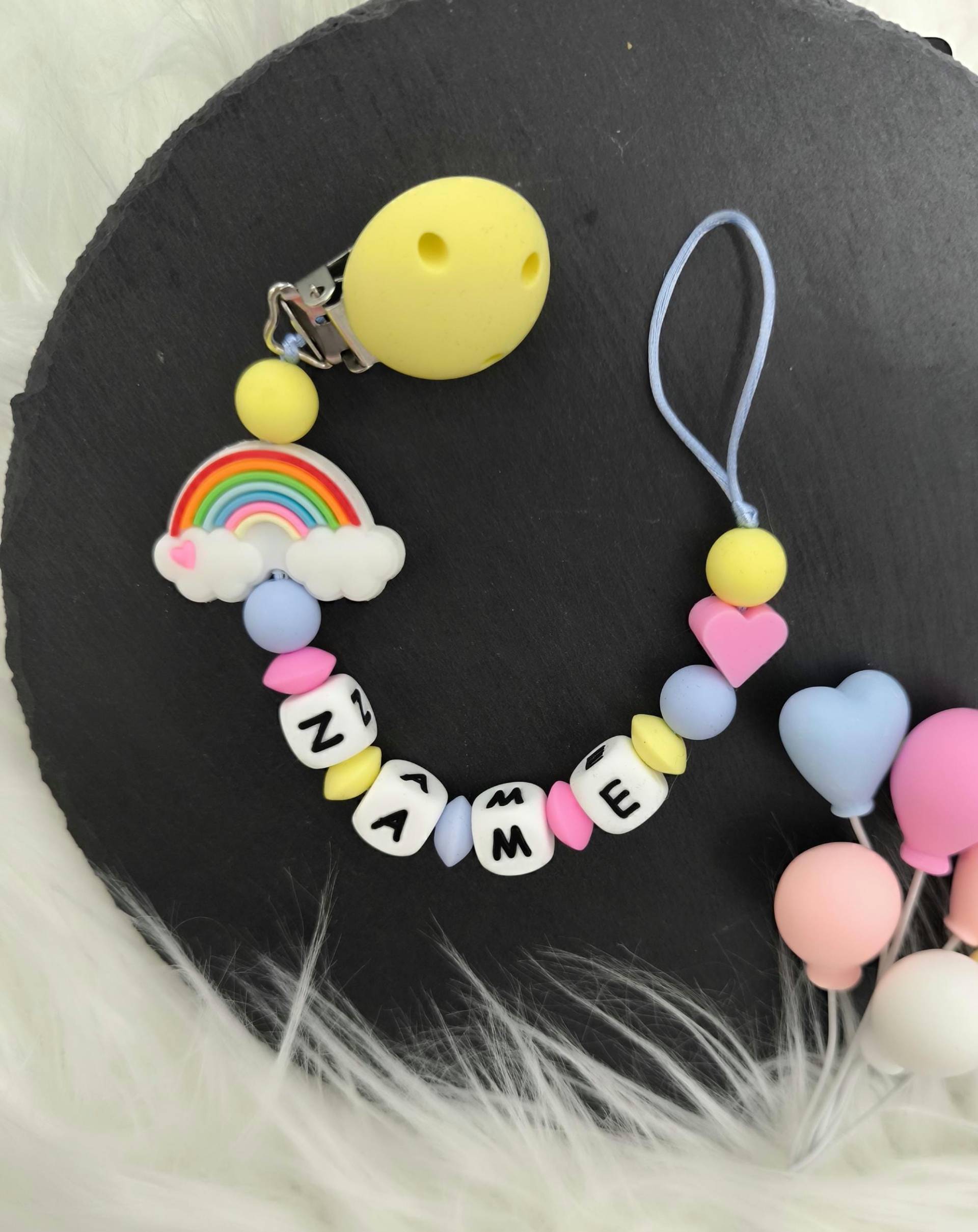 Schnullerkette " Rainbow Personalisiert Mit Namen Inkl. Geschenkbeutel Individuellem Aufdruck Schnullerkette " Rainbow Personalisiert Mit Namen Inkl. Geschenkbeutel Individuellem Aufdruck von Etsy - Dewuna