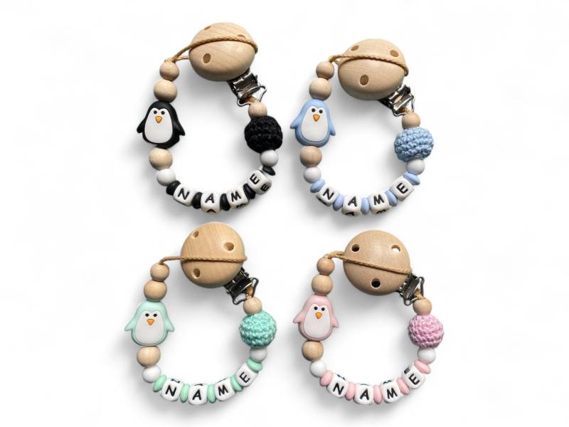 Nuckelkette Schnullerkette Pinguin Mit Namen Und Häkelperle Nuckelkette Schnullerkette Pinguin Mit Namen Und Häkelperle von Etsy - EulenshopVonBiene