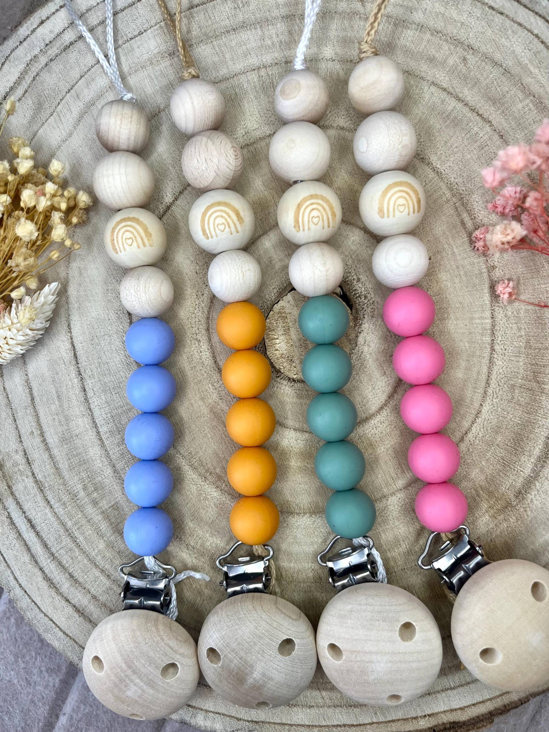 Schnullerkette Mit Regenbogenkugel Schnullerkette Mit Regenbogenkugel von Etsy - GiMiNu