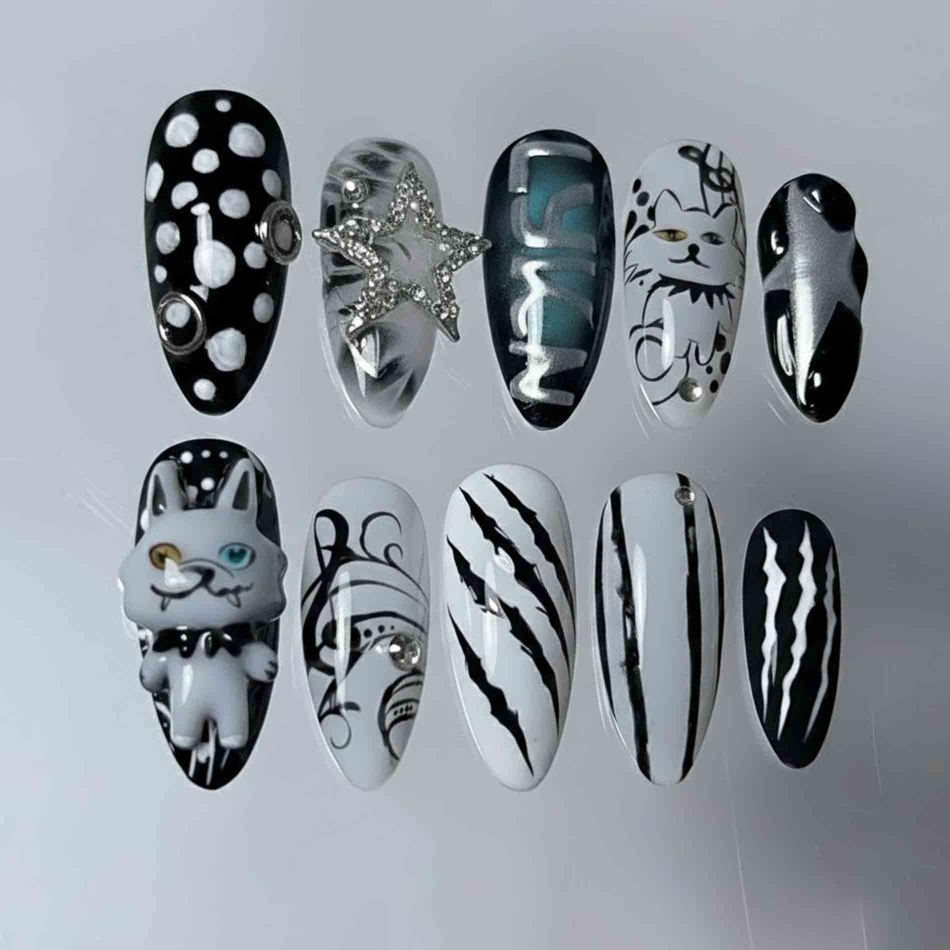 Handmade Black & White Cat Press On Nails | 3D Kitty Charm, Star Accent, Graphic Art Almond Gothic Set von Etsy - HandmadeByDanaLukes