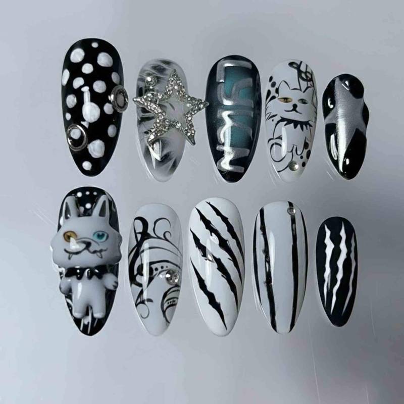 Handmade Black & White Cat Press On Nails | 3D Kitty Charm, Star Accent, Graphic Art Almond Gothic Set von Etsy - HandmadeByDanaLukes