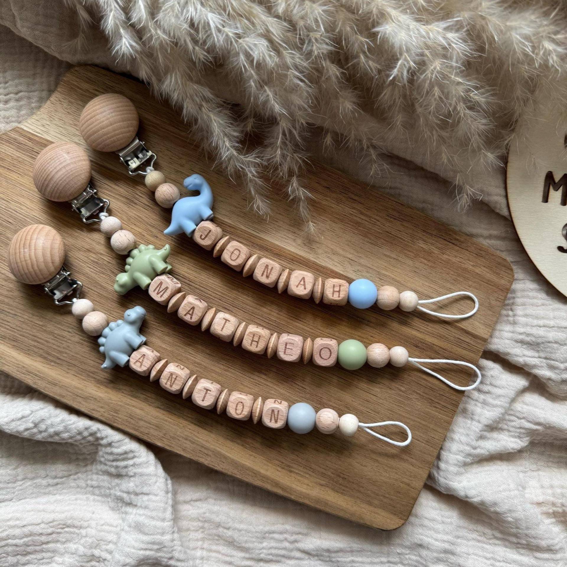 Personalisierte Schnullerkette | Dino Mit Name Jungen Verschiedene Farben Personalisierte Schnullerkette | Dino Mit Name Jungen Verschiedene Farben von Etsy - Hauniper