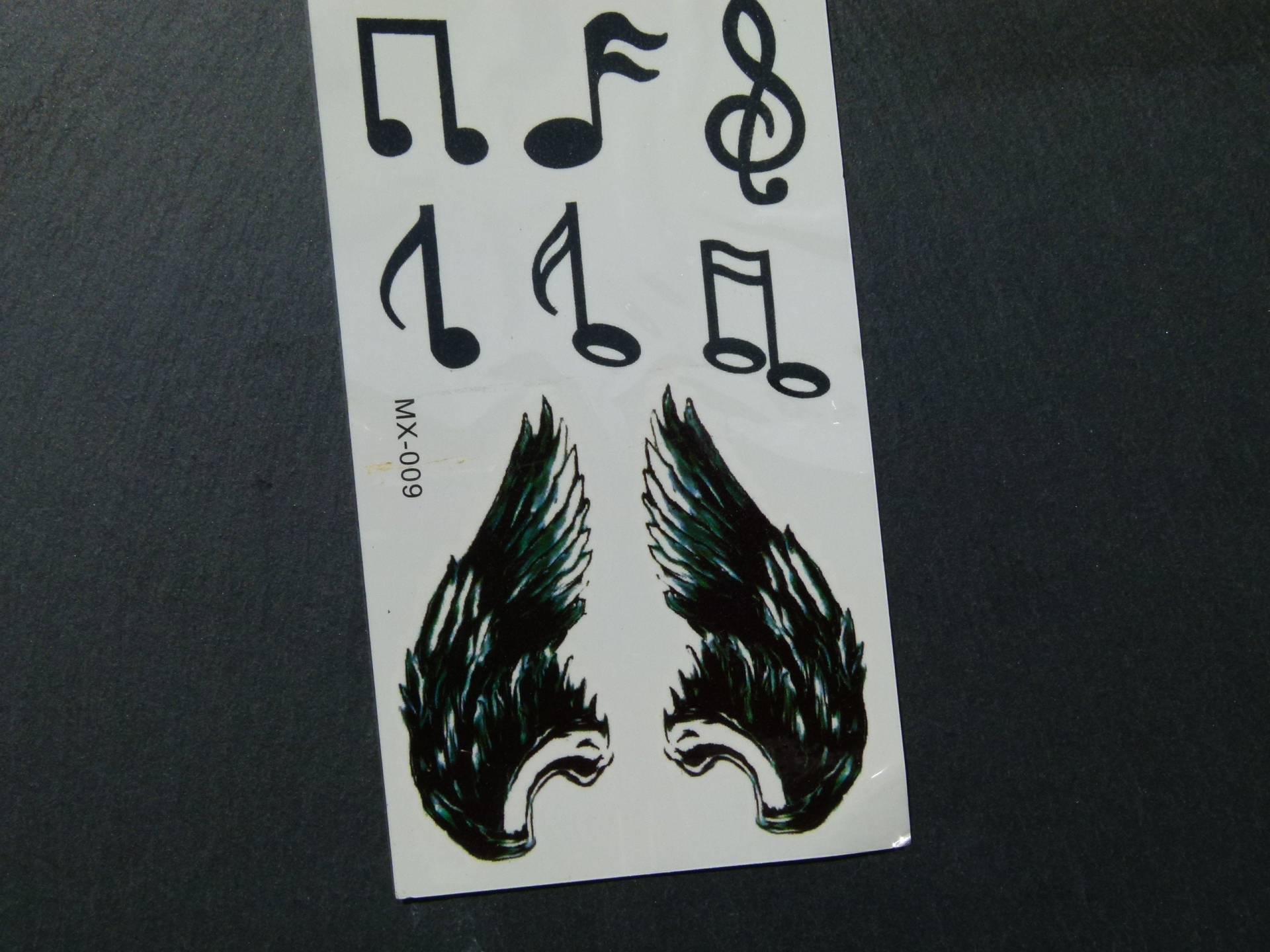 Temporäres Tattoo - Boho Schwarz Noten Flügel Körperschmuck Körperbild Fake Bodytattoo Körpertattoo Temporäres Tattoo - Boho Schwarz Noten Flügel Körperschmuck Körperbild Fake Bodytattoo Körpertattoo von Etsy - TinkyStarShop