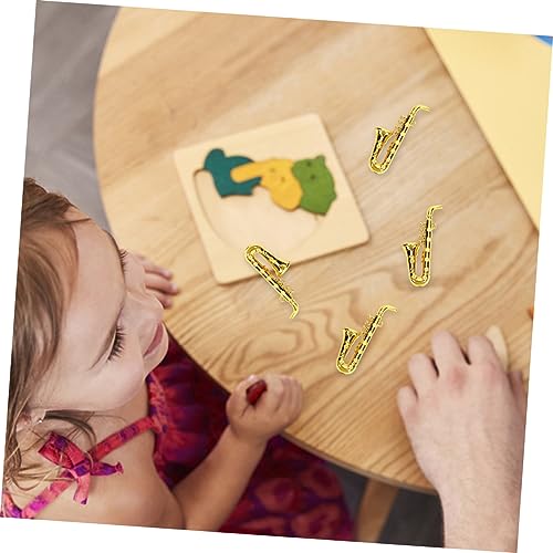 FUNOMOCYA 4 Stück Teiliges Mini Saxophon Modellset Detailreiche Miniatur Musikinstrumente für Puppenhaus Dekoration Langlebig Vielseitig für und Schreibtisch Mini Saxophone für Sammler von FUNOMOCYA
