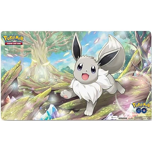 Friki Monkey Pokemon Spielmatten in Werbeboxen, Verschiedene Versionen und Modelle, Ultra-Premium-Matten in Boxen, Größe 61x35CM (Pokémon GO: Radiant Eevee Playmat) von Friki Monkey