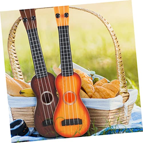 GARIOUANS 2 Stück Teiliges Ukulele aus Robustem Kunststoff Kindgerechtes Mini Musikinstrument für Anfänger und Kleinkinder Fördert Musikalisches Lernen für Jungen und Zufällige Farbe GARIOUANS 2 Stück Teiliges Ukulele aus Robustem Kunststoff Kindgerechtes Mini Musikinstrument für Anfänger und Kleinkinder Fördert Musikalisches Lernen für Jungen und Zufällige Farbe von GARIOUANS