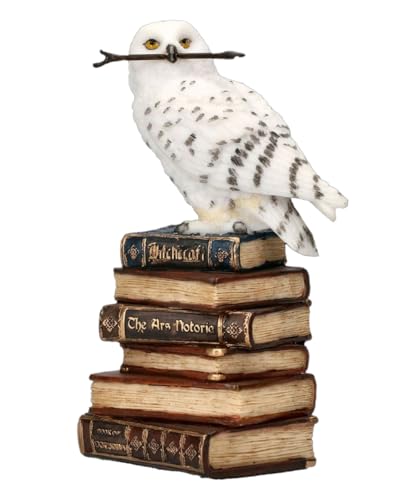 Horror-Shop Schneeeule mit Zauberstab im Schnabel & auf Zauberbücher sitzend 14cm von Horror-Shop