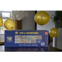 Jumbo Spiele - Jan van Haasteren - 10 Years JvH Studio Surprise item, 1000 Teile, Sort. von Jumbo
