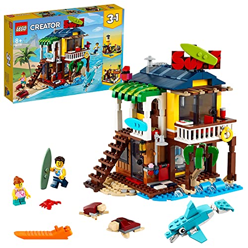 LEGO 31118 Creator 3-in-1 Surfer-Strandhaus, mit Leuchtturm, Poolhaus, Tier-Figuren wie Delfin und Schildkröte, inkl. 2 Minifiguren, kreatives Spielzeug ab 8 Jahren, Geschenk für Mädchen und Jungen von LEGO