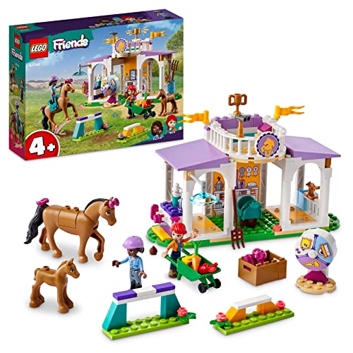 LEGO 41746 Friends Reitschule Set mit 2 Spielzeug-Pferden, Aliya und Mia Mini-Puppen, Reitstall- und Pferdespielzeug, Tierpflege-Geschenk für Kinder, Mädchen und Jungen ab 4 Jahre LEGO 41746 Friends Reitschule Set mit 2 Spielzeug-Pferden, Aliya und Mia Mini-Puppen, Reitstall- und Pferdespielzeug, Tierpflege-Geschenk für Kinder, Mädchen und Jungen ab 4 Jahre von LEGO