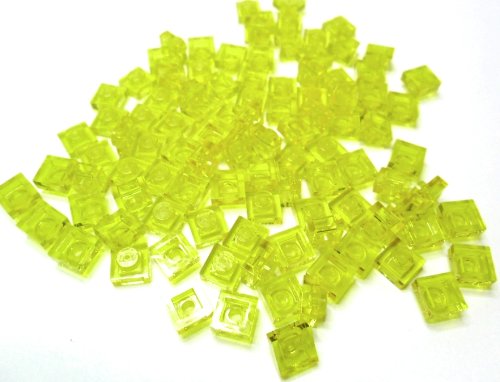 LEGO CITY - 100 Platten 1x1 Noppen in gelb-transparent. von LEGO