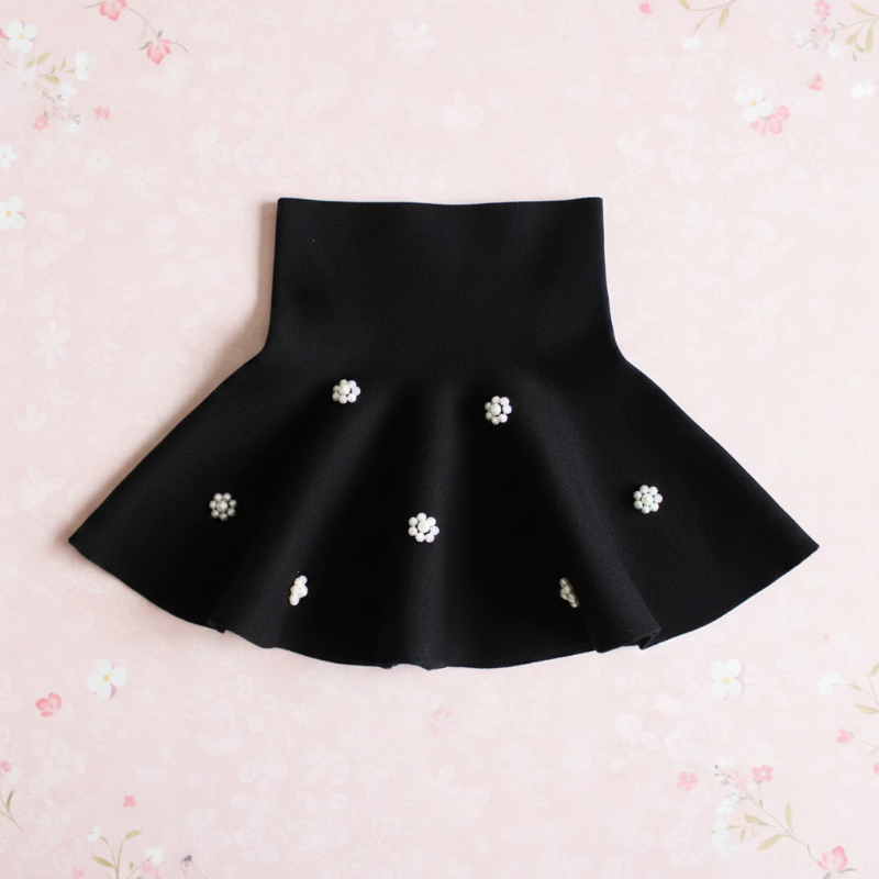 Girls Knitted Skirt – Komfort & stil – Børneskørt Sort / Perleblomst / 110 (2–3 år) | Pädagogisches Holzspielzeug von Mein Kleines Baby