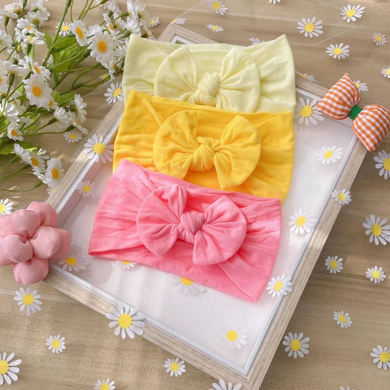 Mini Fashion – Moderigtigt og blødt – Hårbånd med sløjfe til børn Solnedgang (gul-rosa-rød) | Pädagogisches Holzspielzeug von Mein Kleines Baby