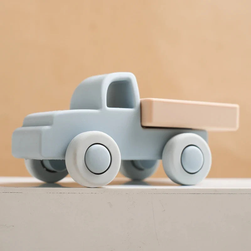 Mini Motion™ – Rollen und Beißen - Fahrzeugspielzeug aus Silikon Blauer Lastwagen | Pädagogisches Holzspielzeug von Mein Kleines Baby
