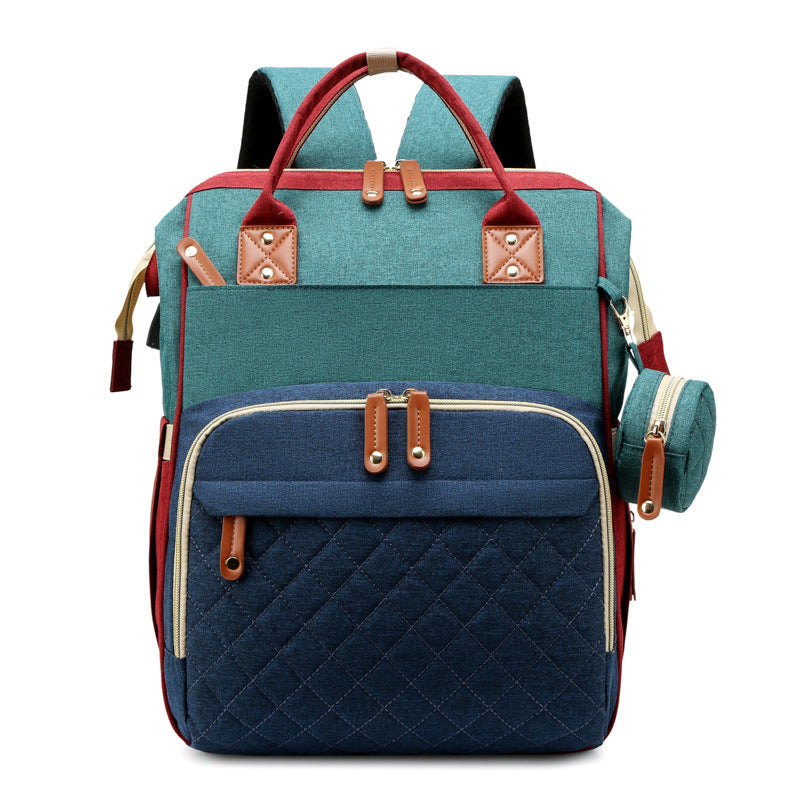 TravelNest– Immer ein Ort der Ruhe – 2-in-1-Wickeltasche mit Babybett Blå och grön | Pädagogisches Holzspielzeug von Mein Kleines Baby