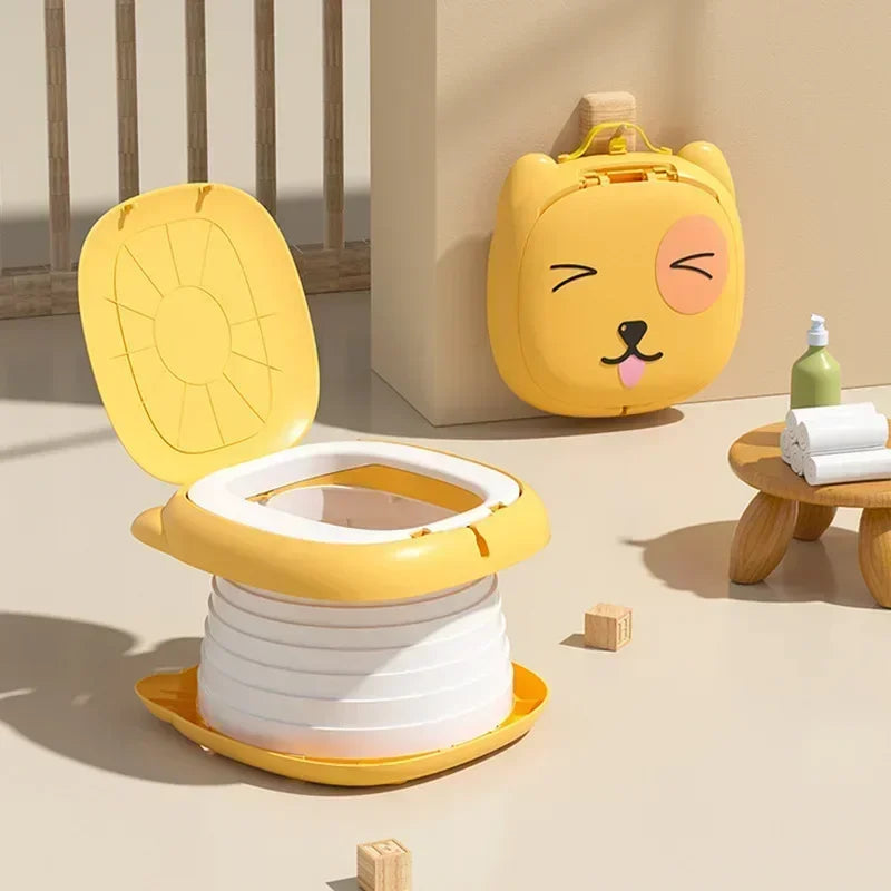 TravelPotty– Kompakt&hygienisch– tragbare Kindertoilette Gelb | Pädagogisches Holzspielzeug von Mein Kleines Baby