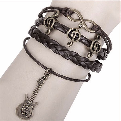 Musikboutique Kübler Bracelet - Treble Clef & Guitar, black Wristband Musikboutique Kübler Bracelet - Treble Clef & Guitar, black Wristband von Musikboutique Kübler