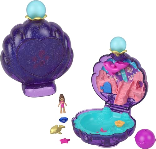 Polly Pocket Puppen & Zubehör, Unterwasser-Lagunenmuschel Kompakt mit Mikro-Puppe & Ozeanhaustier, Reisespielzeug mit Wasserspiel Polly Pocket Puppen & Zubehör, Unterwasser-Lagunenmuschel Kompakt mit Mikro-Puppe & Ozeanhaustier, Reisespielzeug mit Wasserspiel von Polly Pocket