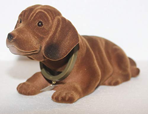 RAKSO Wackel Dackel Figur Hund Dackel Wackelfigur H 14 cm groß liegend mit Wackelkopf von RAKSO