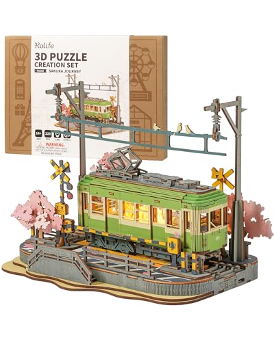 Rolife 3D Puzzle Sakura Reise Holzpuzzles für Erwachsene zu Bauen Sakura Densya Modell Kits mit LED-Lichtern Animation Szene Wohndekoration Romantische Geburtstagsgeschenke für Sie/Ihn Rolife 3D Puzzle Sakura Reise Holzpuzzles für Erwachsene zu Bauen Sakura Densya Modell Kits mit LED-Lichtern Animation Szene Wohndekoration Romantische Geburtstagsgeschenke für Sie/Ihn von Rolife