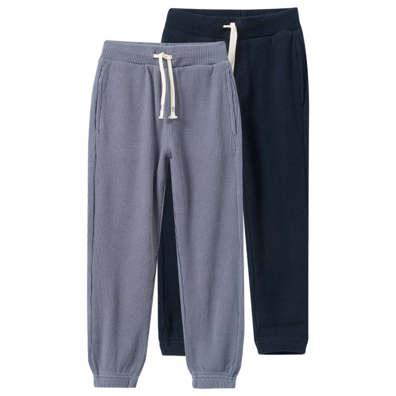 2 Jungem Jogginghosen aus Waffel-Piqué 2 Jungem Jogginghosen aus Waffel-Piqué von Topolino