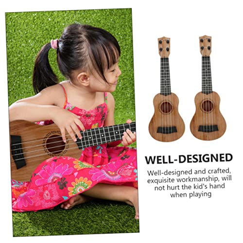 WEKADRIN 2 Stück Ukulele Imitation Musikinstrument aus Langlebigem Kunststoff Realistisch Gestaltetes Gitarren Frühe Musikalische und Mobiles von WEKADRIN