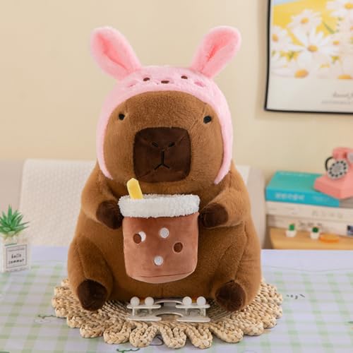 Xiyocadt Capybara Kuscheltier mit Haube, Plushie Capibara Plüschtier, Kapibara Plüschkissen Spielzeug, Weich Stofftier Kissen Geschenk für Mädchen Jungen Kinder (30CM,Milchteepulver) von Xiyocadt