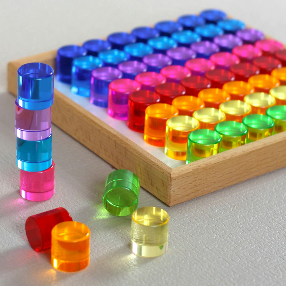 64 Lichtbauzylinder im Holzrahmen 21x21 cm