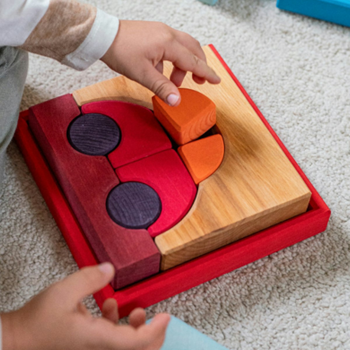 Bauspiel rot 8 Teile im Rahmen 18,6 x 18,6 cm