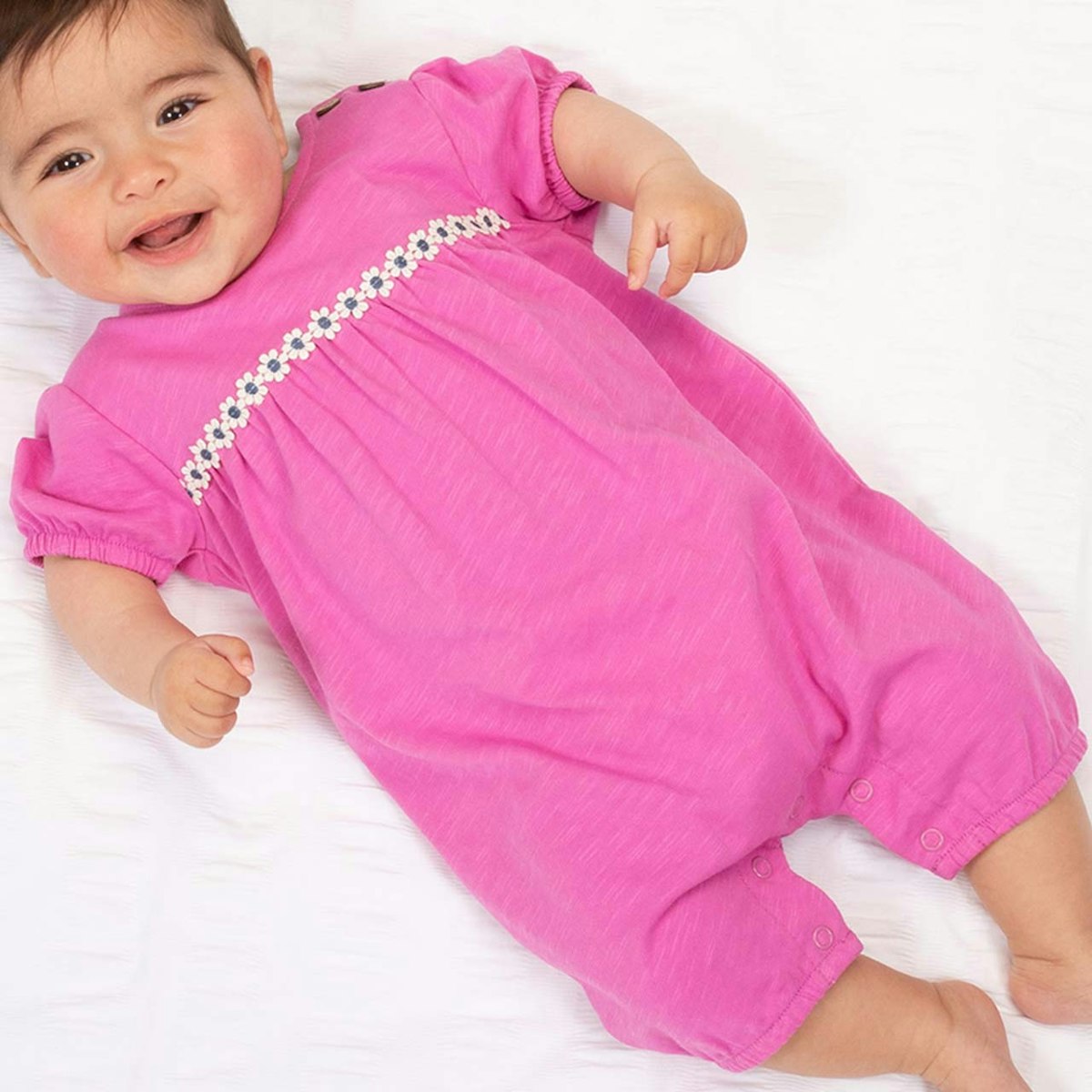 Beachbody Gänseblümchen pink 68/74