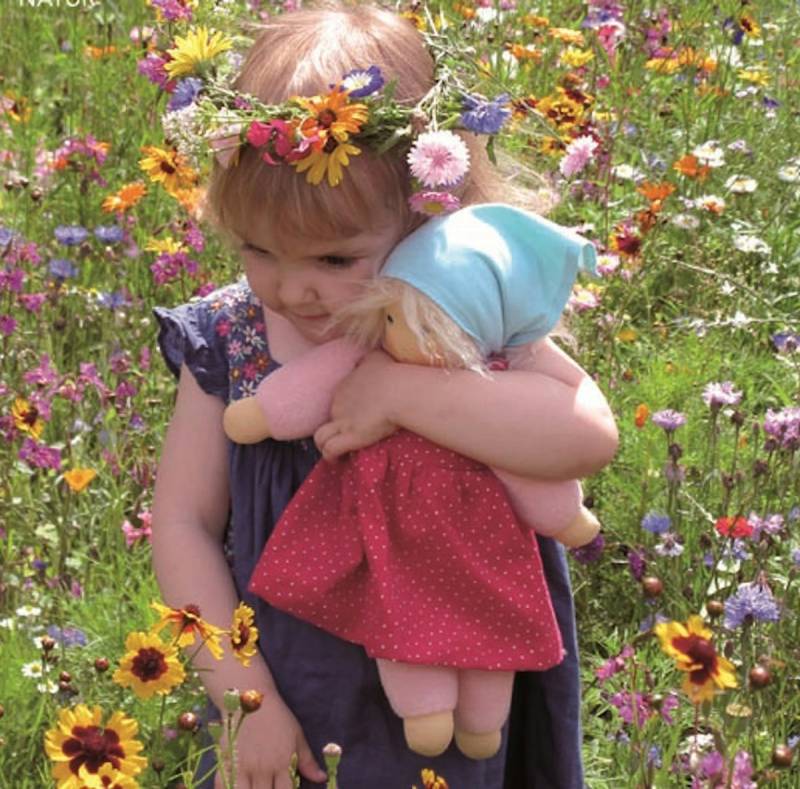 Bio Puppe Lotti rot mit Haaren & ausziehbarer Kleidung