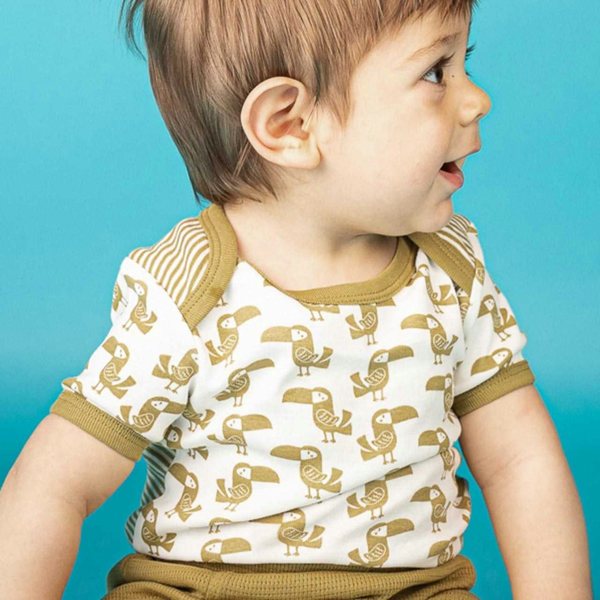 Kurzarm Body Tukan-Motive khaki 62/68