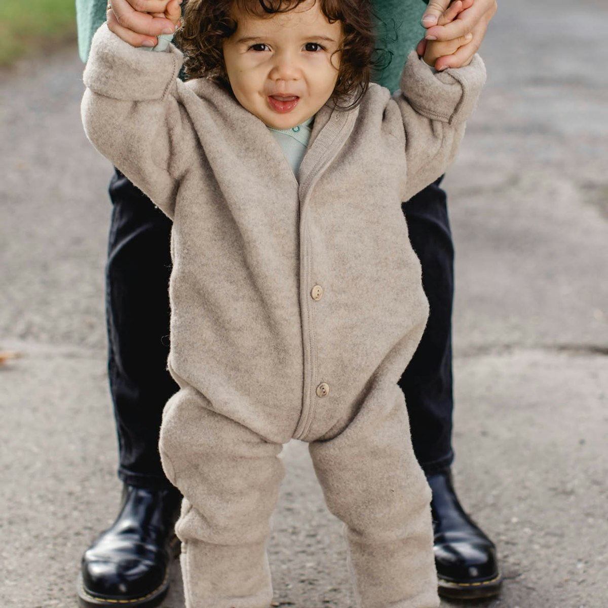 Merino Kapuzenoverall mit Arm- und Beinumschlägen 74/80