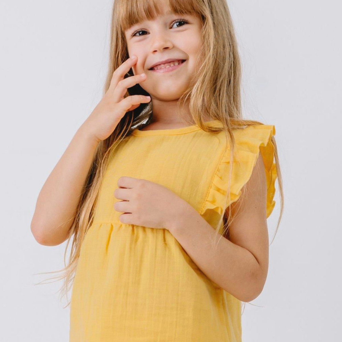Musselin Bluse mit Voläntchen gelb 116