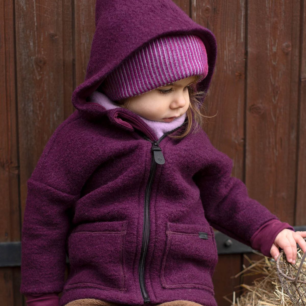 Schurwolle Fleece Kapuzenjacke lila 122/128