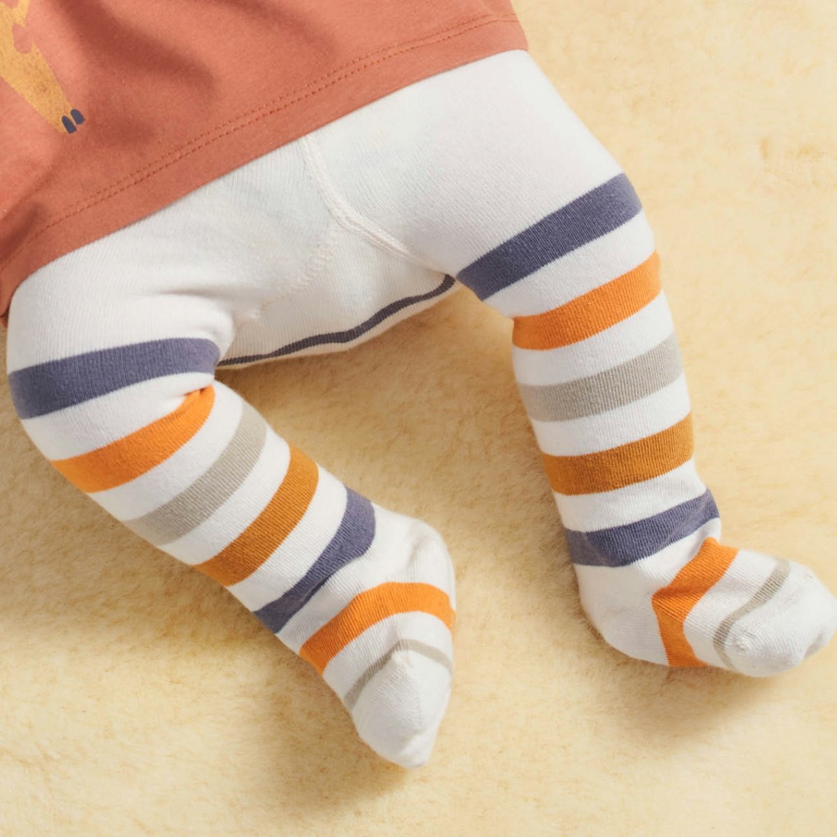 Streifen Strumpfhose mitwachsend orange creme 74/80