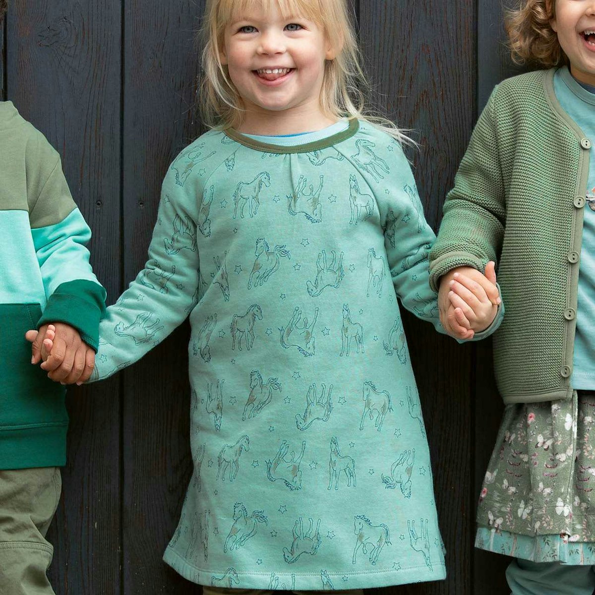 Sweatkleid Pferde-Druck in türkis 140