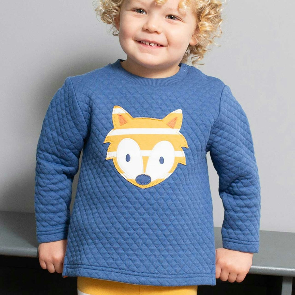 Warmer Stepp Pullover mit Fuchs-Aufnäher 68