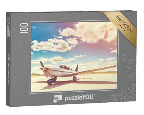 puzzleYOU: Puzzle 100 Teile „Parkendes Propellerflugzeug“ – aus der Puzzle-Kollektion Flugzeuge von puzzleYOU
